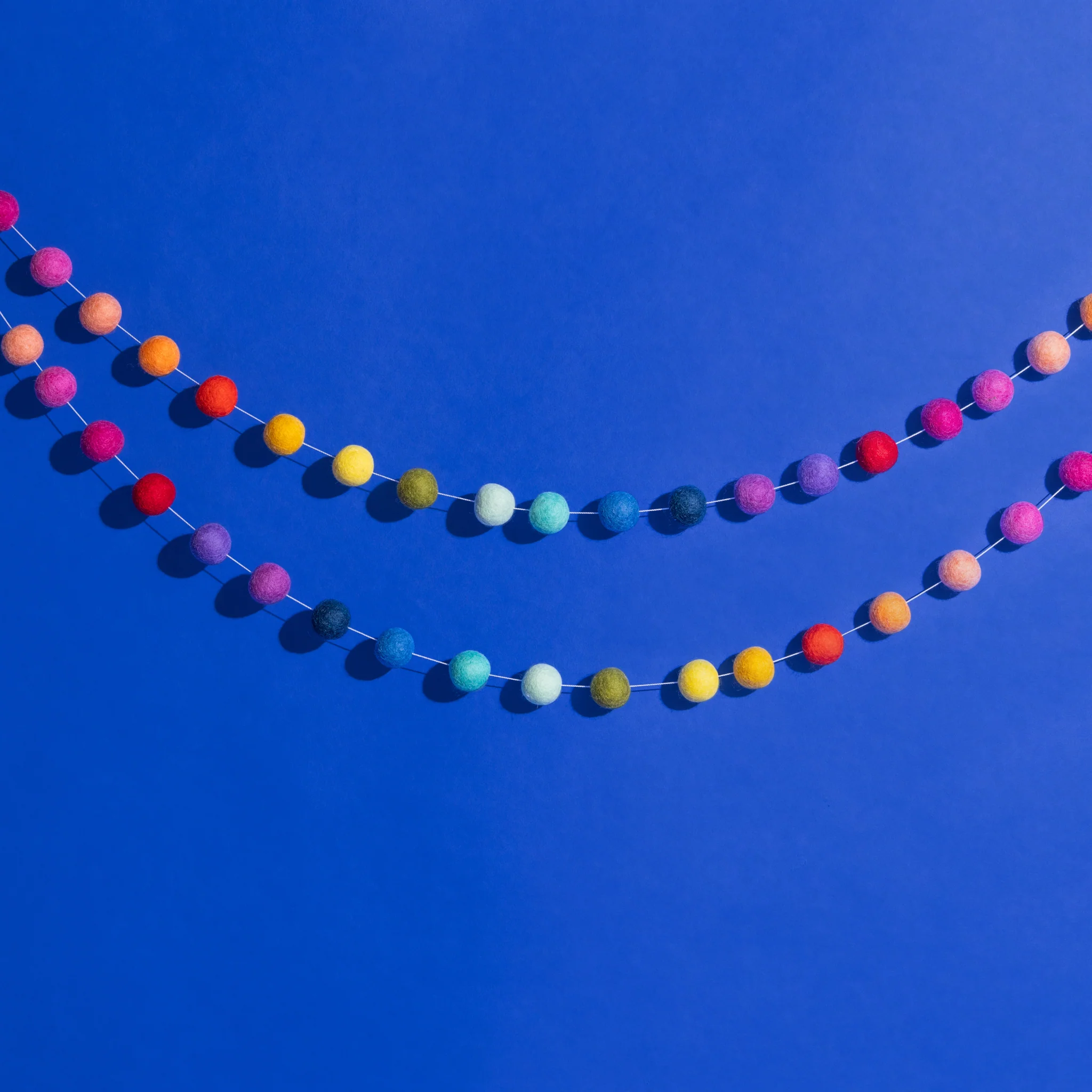 Fair Trade Felt Ball Garland - Rainbow - Image 4
